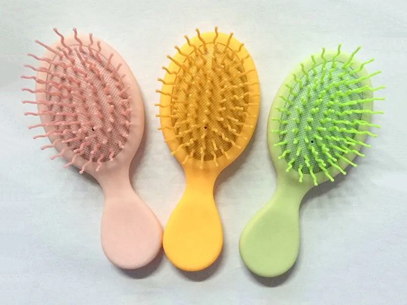 Mini perie de păr colorată pentru descurcarea copiilor