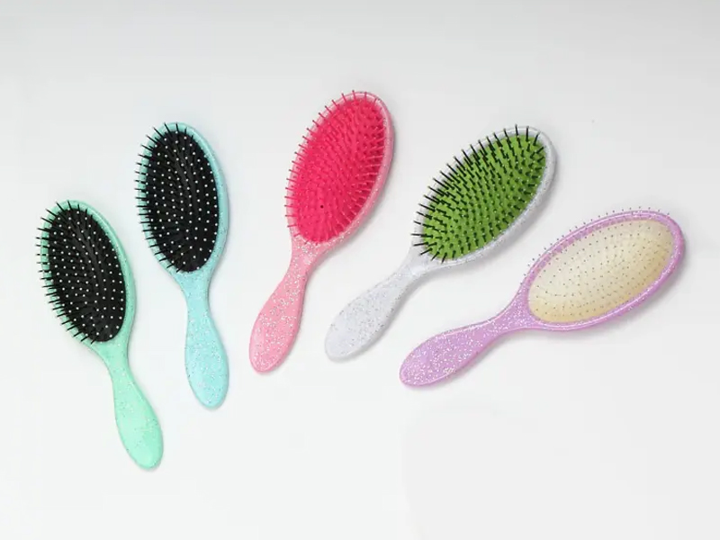 Perie de păr din plastic cu peri de descurcare